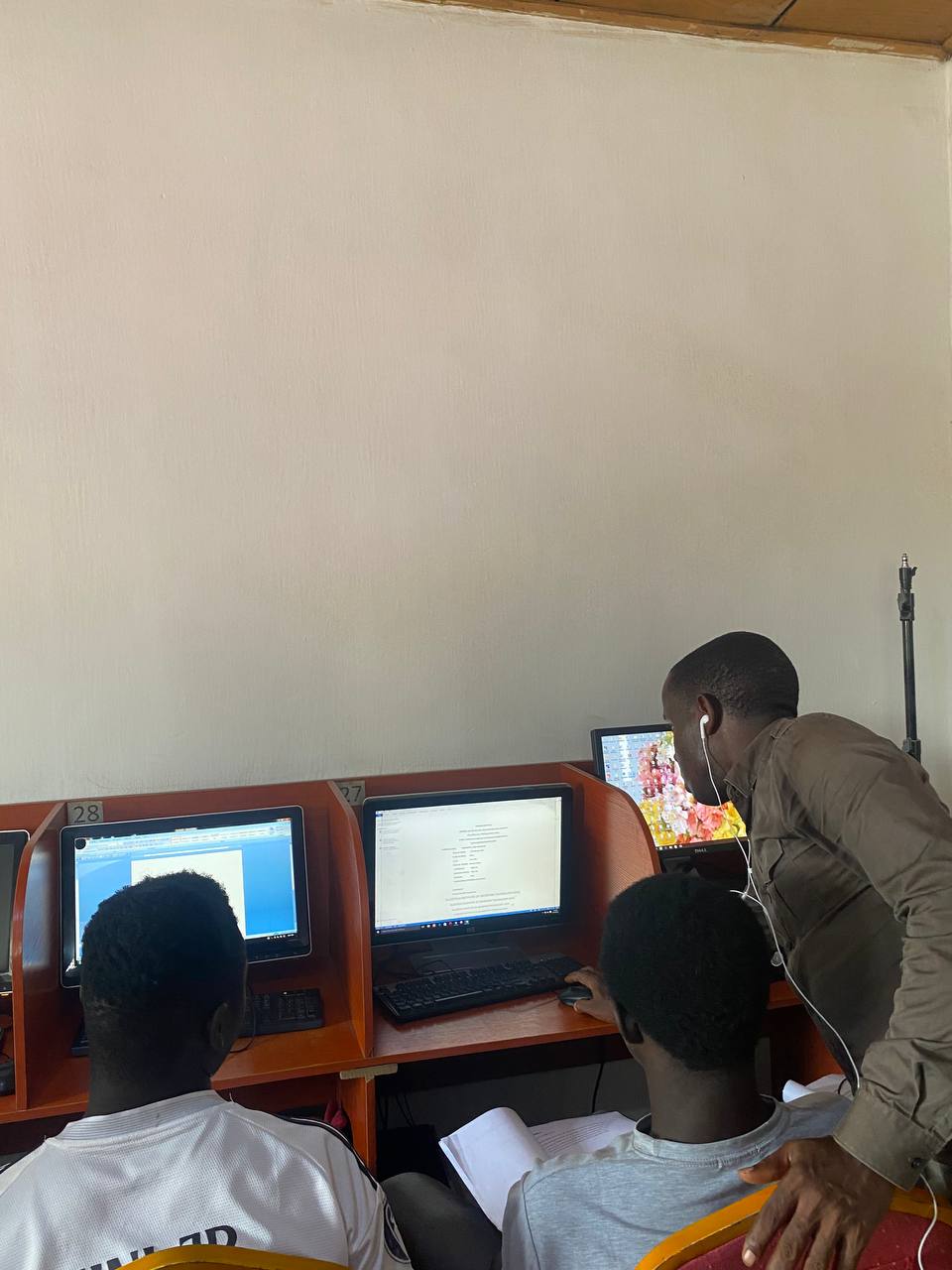 Students practicing at desktop workstations